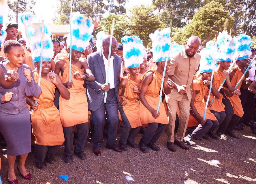 Deputy President Rigathi Gachagua joins Kianyaga Boys High School students in a Kikuyu traditional dance. He is an alumnus of the school. Photo: DPCS