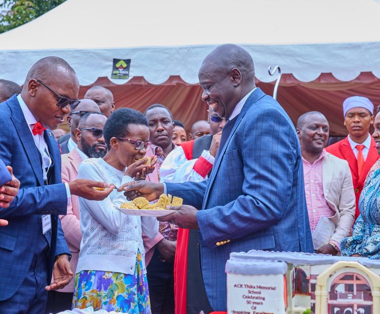 Deputy President Rigathi Gachagua and his wife Pastor Dorcas Rigathi share cake with congregants  during Golden Jubilee celebrations of ACK Thika Memorial Church School in Gatanga Sub-County, Murang'a County, on August 2, 2024.